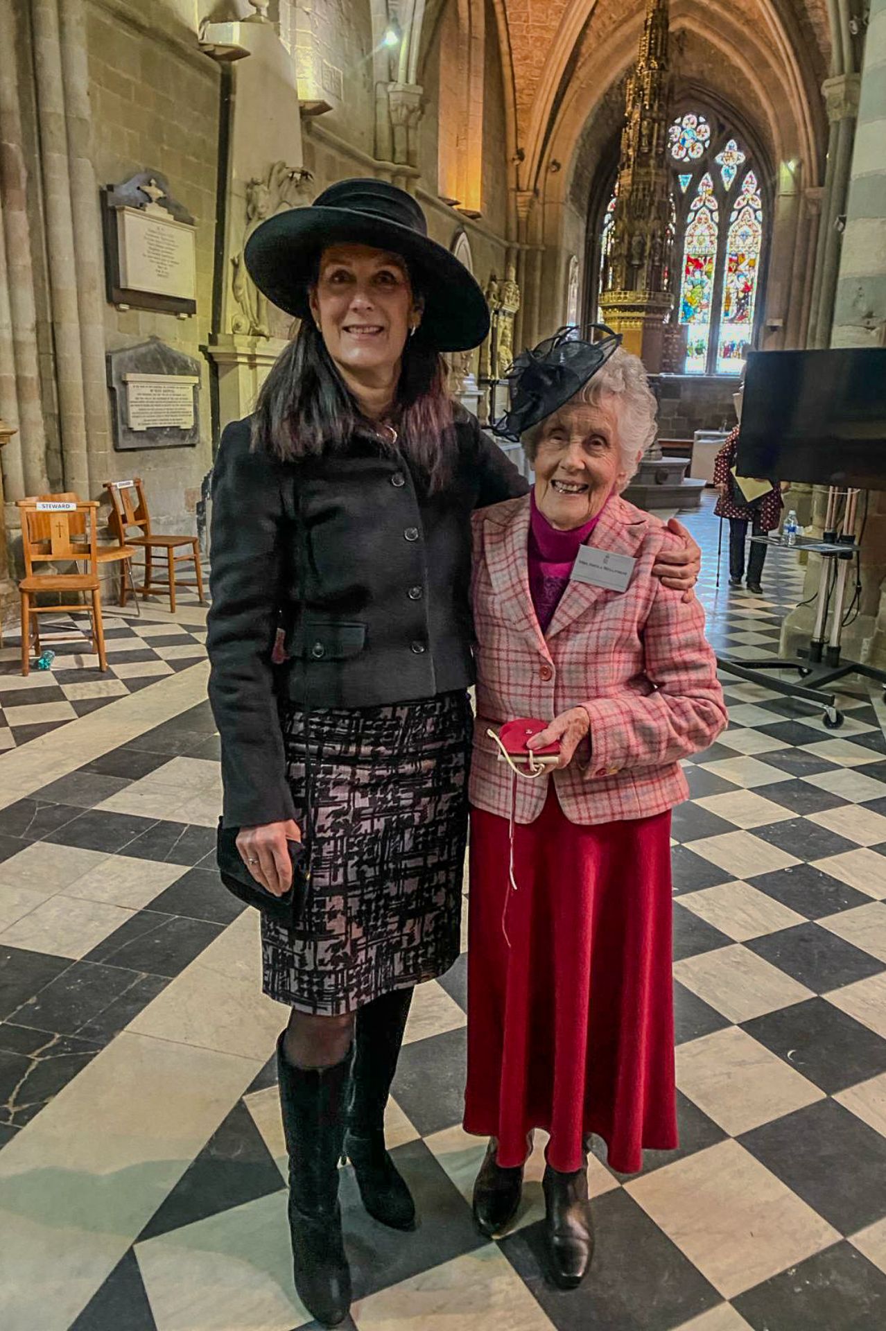 Sheila stood with her daughter holding her Maundy Money purse