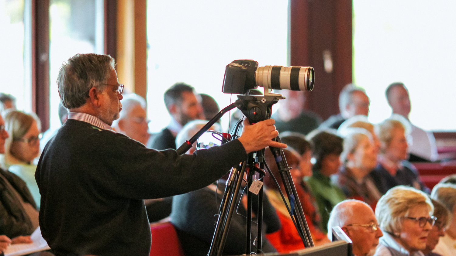 Camera operator at conference